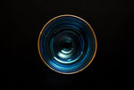 Blue glass with gold rim
